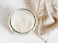 Wheat sourdough starter, top view, copy space Royalty Free Stock Photo