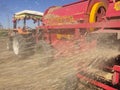 Wheat threshing being done in the fields Royalty Free Stock Photo