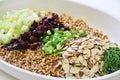 Wheatberry salad ingredients in bowl