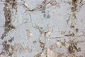 Wheathered concrete wall with great number of cracks