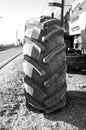 Wheel of an agricultural tractor, detail. Black and white image Royalty Free Stock Photo