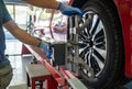 Wheel alignment of a vehicle in progress