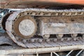 Wheel Backhoe on a drawbar trailer.