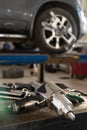 Wheel balancing in a car repair shop. Royalty Free Stock Photo