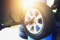 Wheel balancing or repair and change car tire at auto service garage or workshop by mechanic Royalty Free Stock Photo