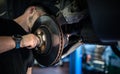 Wheel bearing repair at auto service Royalty Free Stock Photo