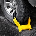 Wheel Boot or Tire Lock for Illegal Parking Violation Immobilize Vehicle Car Royalty Free Stock Photo