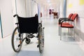 Wheel chair in the hospital corridor. Healthcare concept Royalty Free Stock Photo