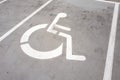 Wheel chair symbol on a parking place. Royalty Free Stock Photo