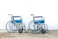 wheel chairs standby for help a old people Royalty Free Stock Photo