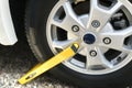 Wheel clamp mounted on vehicle Royalty Free Stock Photo