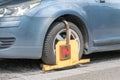 Wheel clamp. Penalty for parking car on restricted place Royalty Free Stock Photo