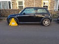 Wheel-Clamped Car Royalty Free Stock Photo