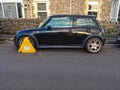 Wheel-Clamped Car