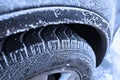Wheel covered with hoarfrost concept of winter weather Royalty Free Stock Photo