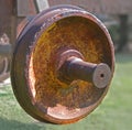 The wheel covered with rust from the car of the old railway