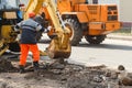 Wheel excavator digging trench on rocky land Royalty Free Stock Photo