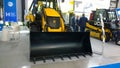 Wheel Excavator Loader JCB at innovative industrial exhibition. Production and supply of road construction, log handling and Royalty Free Stock Photo