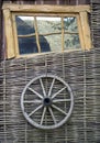 Wheel. fence. window Royalty Free Stock Photo
