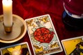 Wheel Of Fortune Card And Crystal Ball Under Candle Light. Cartomancy Is Fortune Telling Using Cards, While Scrying And