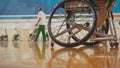 Wheel of handicapped basketball player in a wheelchair during sportive training Royalty Free Stock Photo