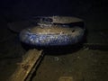 The wheel of a Japanese Mitsubushi Zero fighter in the cargo hold of a ship sunk at Truk Lagoon