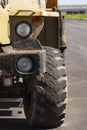 Wheel of a large powerful truck with a rough tread