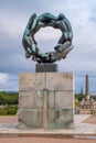 The wheel of life sculpture in Vigeland Park open air art exhibition - Vigelandsparken - surrounding Monolith sculpture,