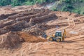 Wheel loader excavator machine working in construction site. wheel loader at sandpit during earthmoving works Royalty Free Stock Photo