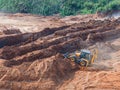 Wheel loader excavator machine working in construction site. wheel loader at sandpit during earthmoving works Royalty Free Stock Photo