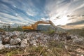 Wheel loader excavator at mountains work Royalty Free Stock Photo