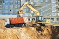 Wheel loader excavator and tipper dumper Royalty Free Stock Photo