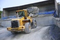 Wheel loader Excavator unloading sand Royalty Free Stock Photo