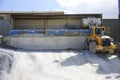 Wheel loader Excavator unloading sand Royalty Free Stock Photo