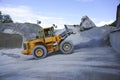 Wheel loader Excavator unloading sand Royalty Free Stock Photo