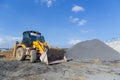 Wheel loader Excavator unloading sand Royalty Free Stock Photo