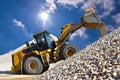 Wheel loader in a gravel pit during mining - heavy construction
