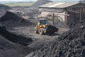 Wheel loader machine loading coal Royalty Free Stock Photo