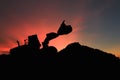 Wheel loader silhouette are digging the soil in the construction site. Royalty Free Stock Photo