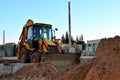 Wheel loader tractor bulldozer in sandpit. Royalty Free Stock Photo