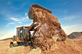 Wheel loader unloading soil at construction site