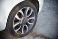 Wheel of a parked Fiat 500 car