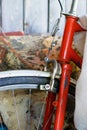 Wheel and part of the handlebars of old red bicycle Royalty Free Stock Photo