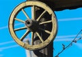 Wheel of the past. An ancient old wooden wheel from a rural cart