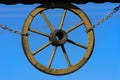 Wheel of the past. An antique old wooden wheel from a rural cart