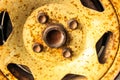 Wheel plate dish rusted metallic car machine old parts in garage Royalty Free Stock Photo