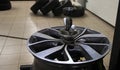 Wheel Rim Balanced In A Tire Workshop Royalty Free Stock Photo