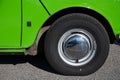 Wheel rim of an old green Citroen Mehari car