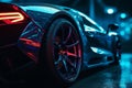 Wheel rim of a speed sports car with vibrant colors and neon lights, exuding a sense of speed and excitement. Racing Car Rims in Royalty Free Stock Photo