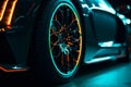 Wheel rim of a speed sports car with vibrant colors and neon lights, exuding a sense of speed and excitement. Racing Car Rims in Royalty Free Stock Photo